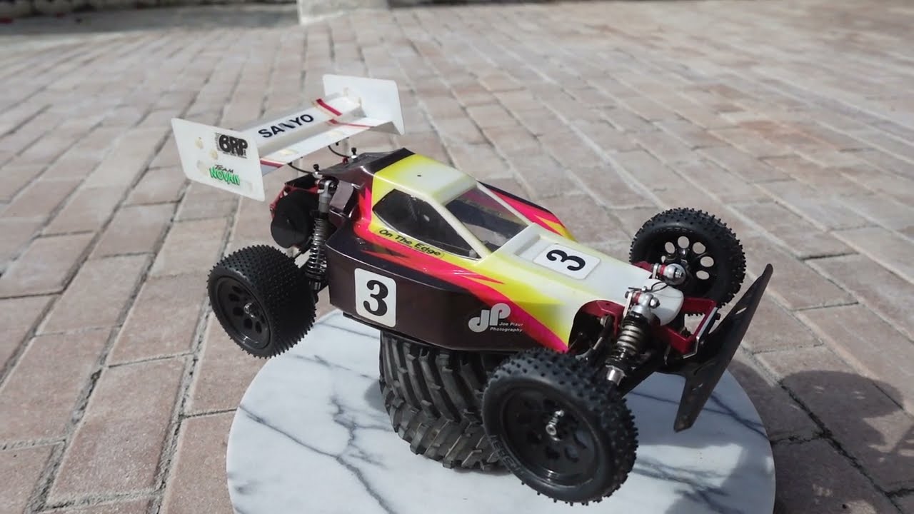 Vintage Kyosho Optima offroad buggy with Hot Trick upgrades