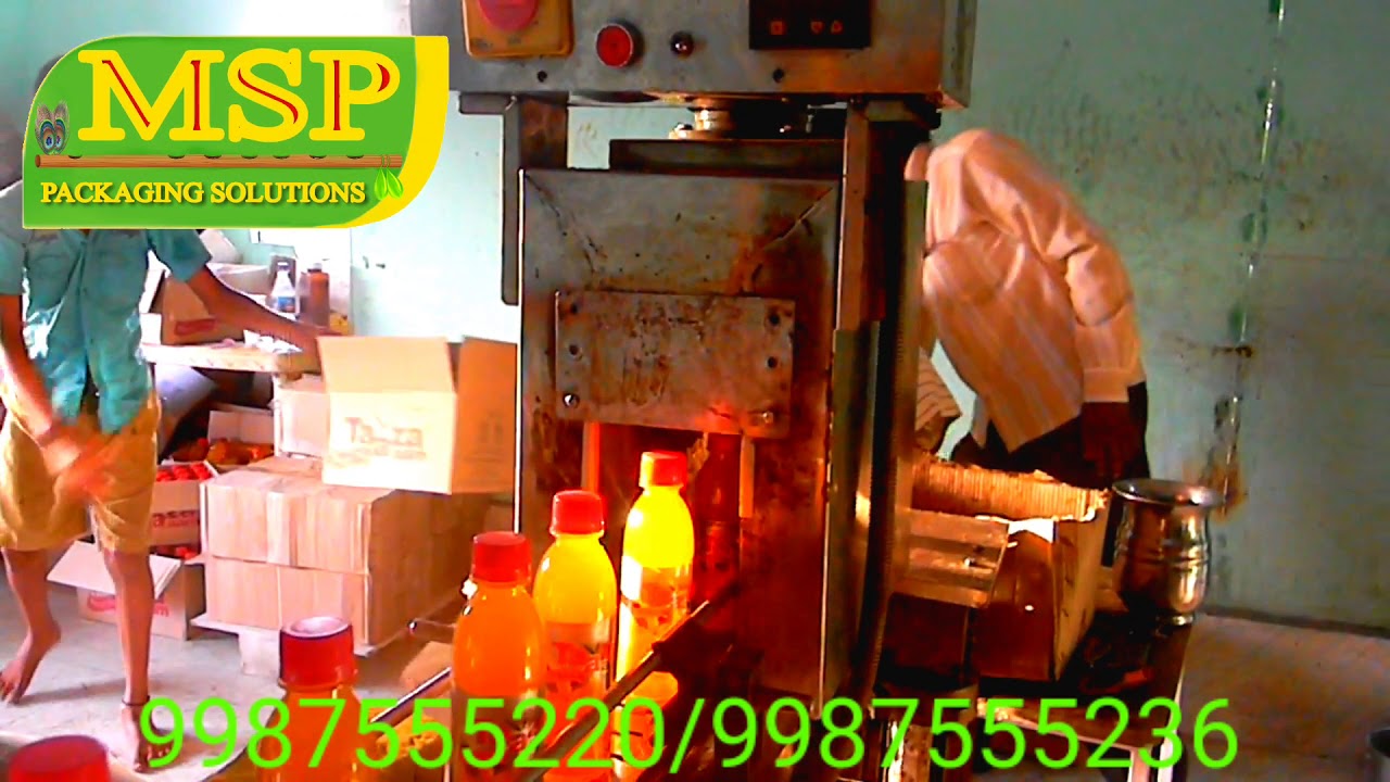 Hot juice bottle filling capping and sleeve shrinking machine for all types of hot liquids