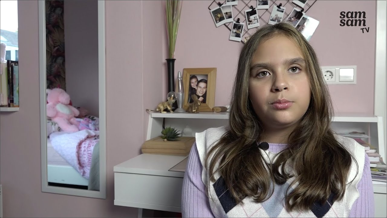 Pauline zit in een rolstoel