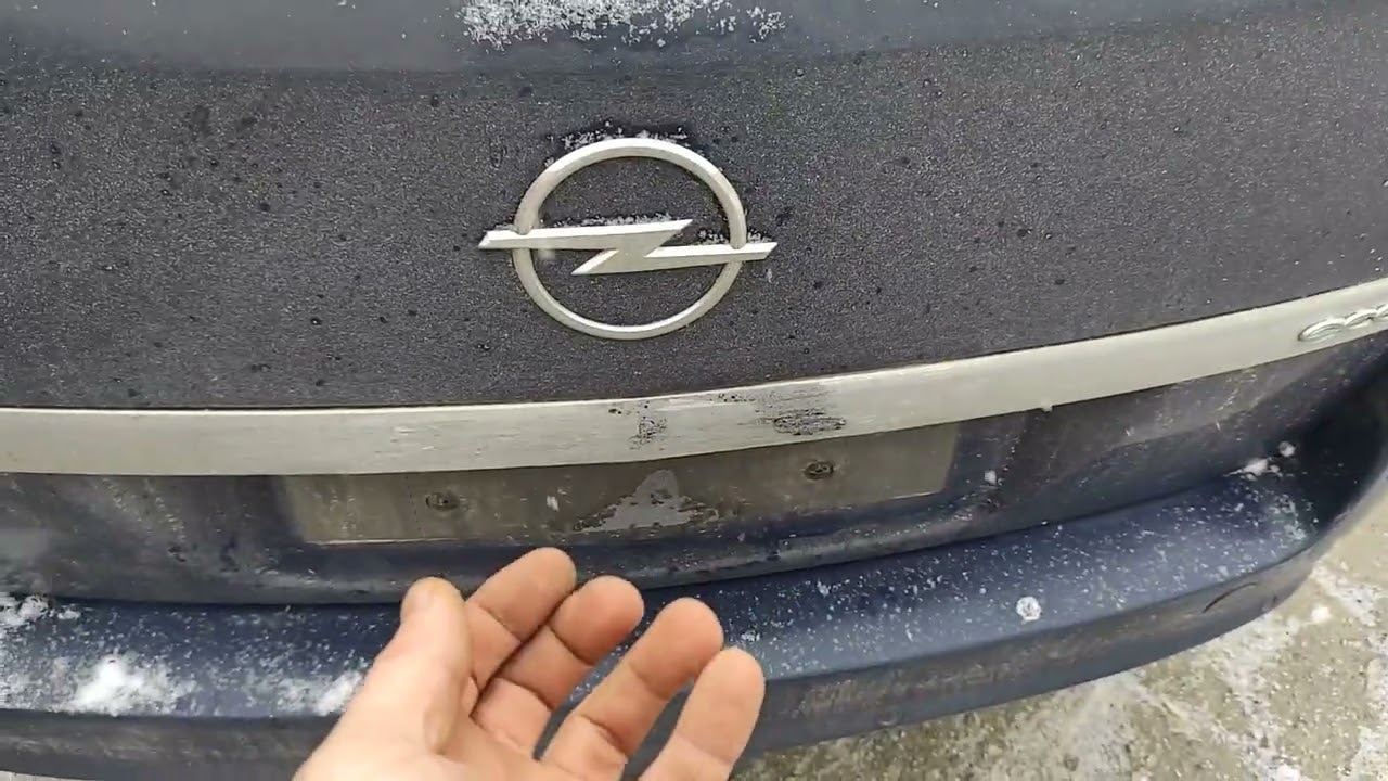 горит сервисный значек, поиск и замена перегоревшей лампы подсветки номера опель астра