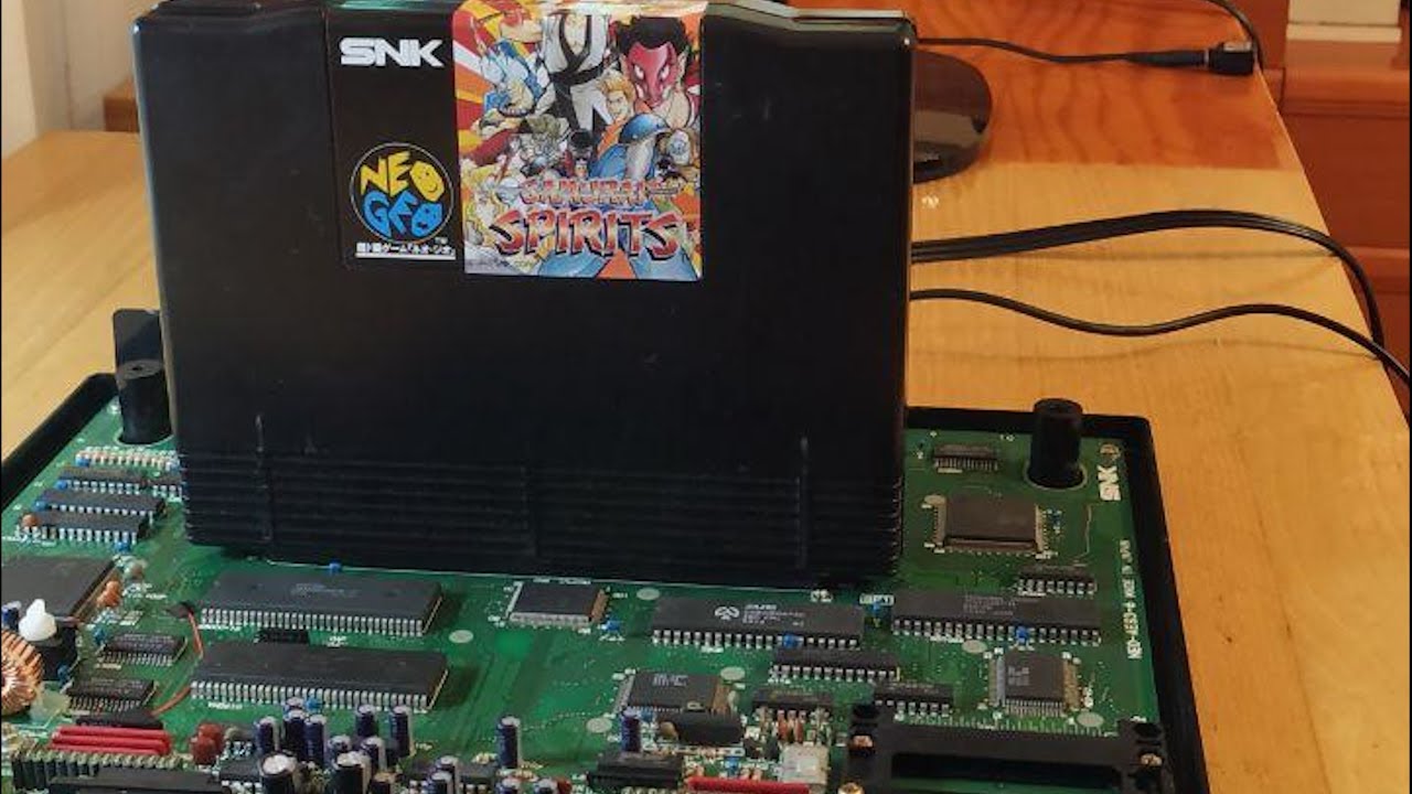 Neo Geo AES en estado junk de Japón reparada por fallo Work RAM error