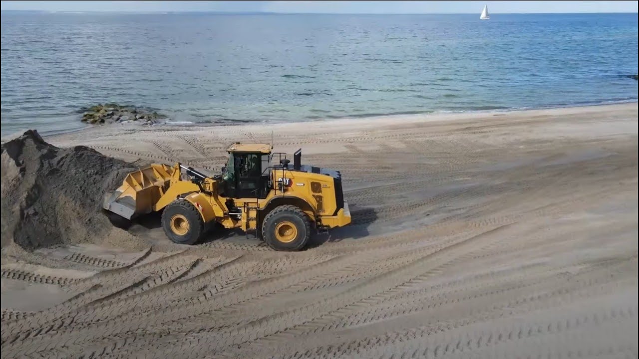 BUG Front loader CAT 966M / truck CAT 725C