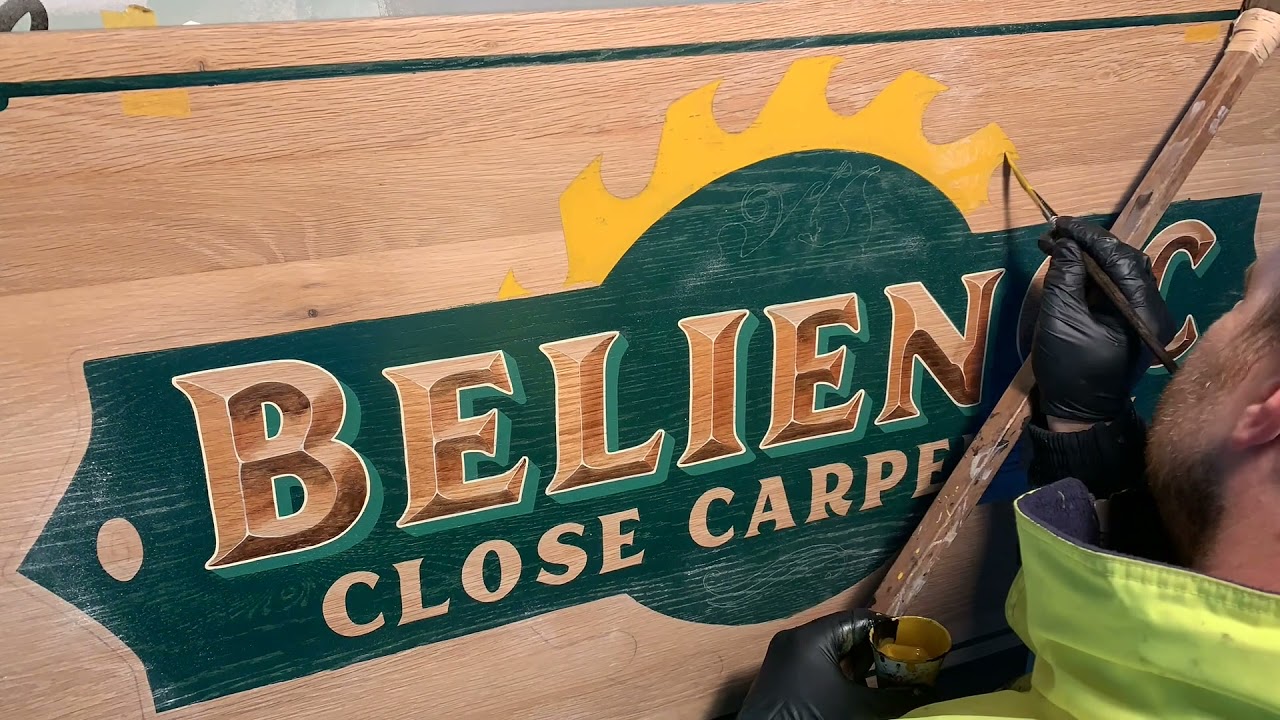 Signpainting process of a sign for a carpenter