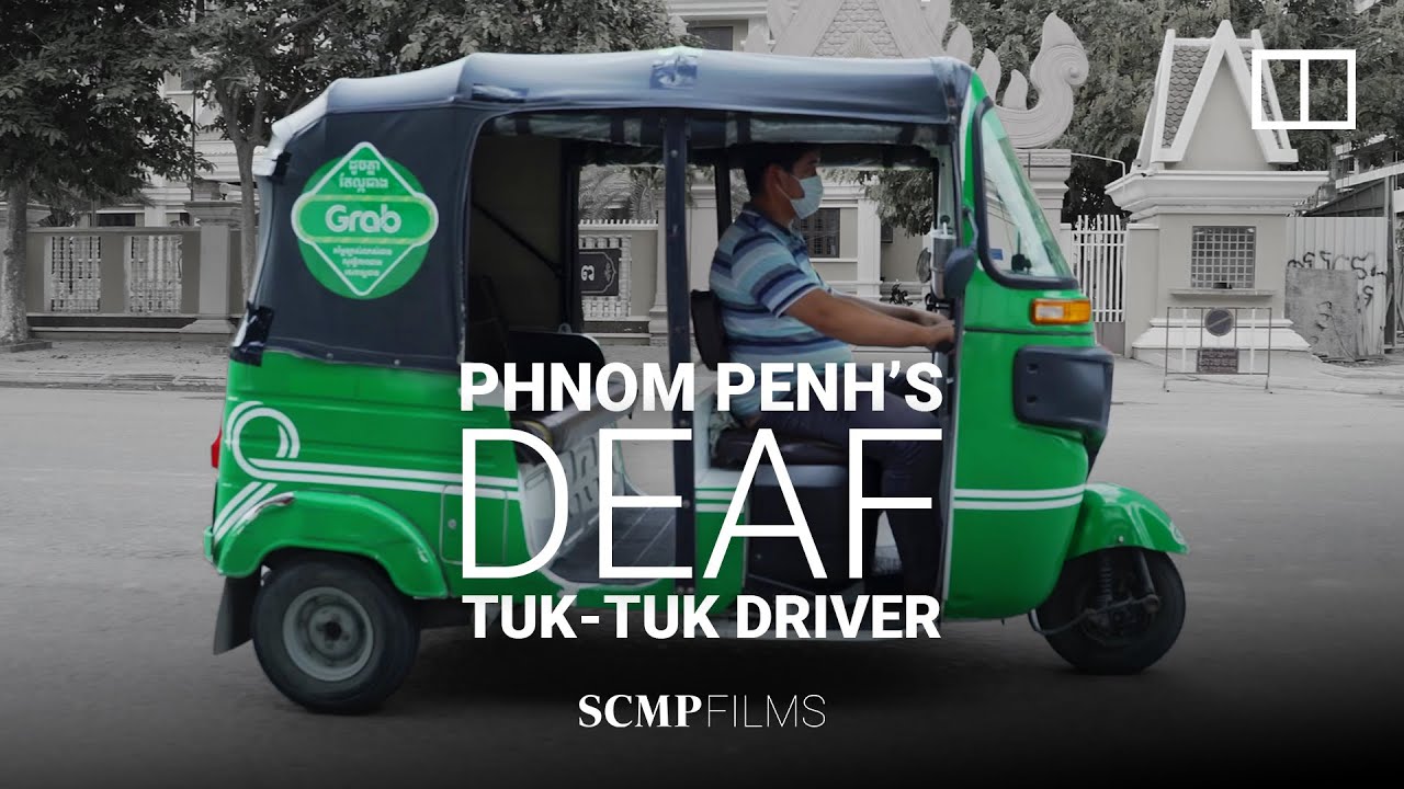 Cambodian tuk-tuk driver conquers hearing disability and Phnom Penh roads to support his family