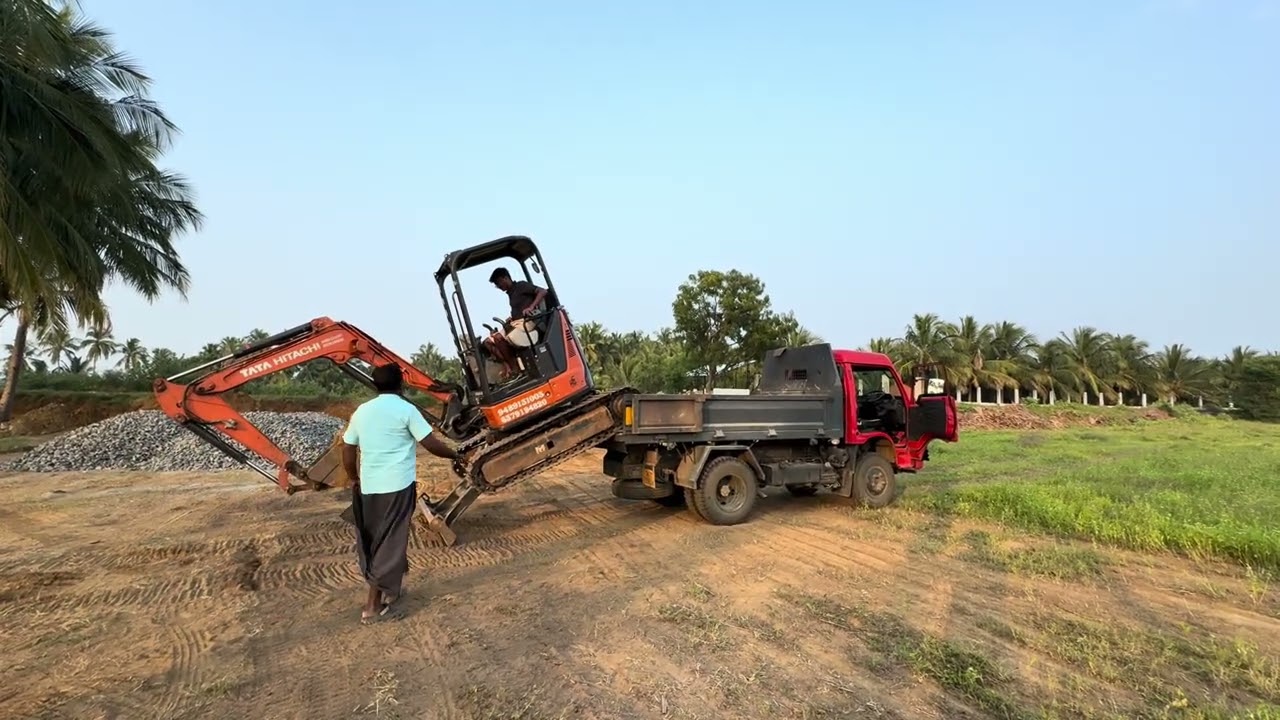 TATA HITACHI MINI 33u CLIMBING IN LOADKING