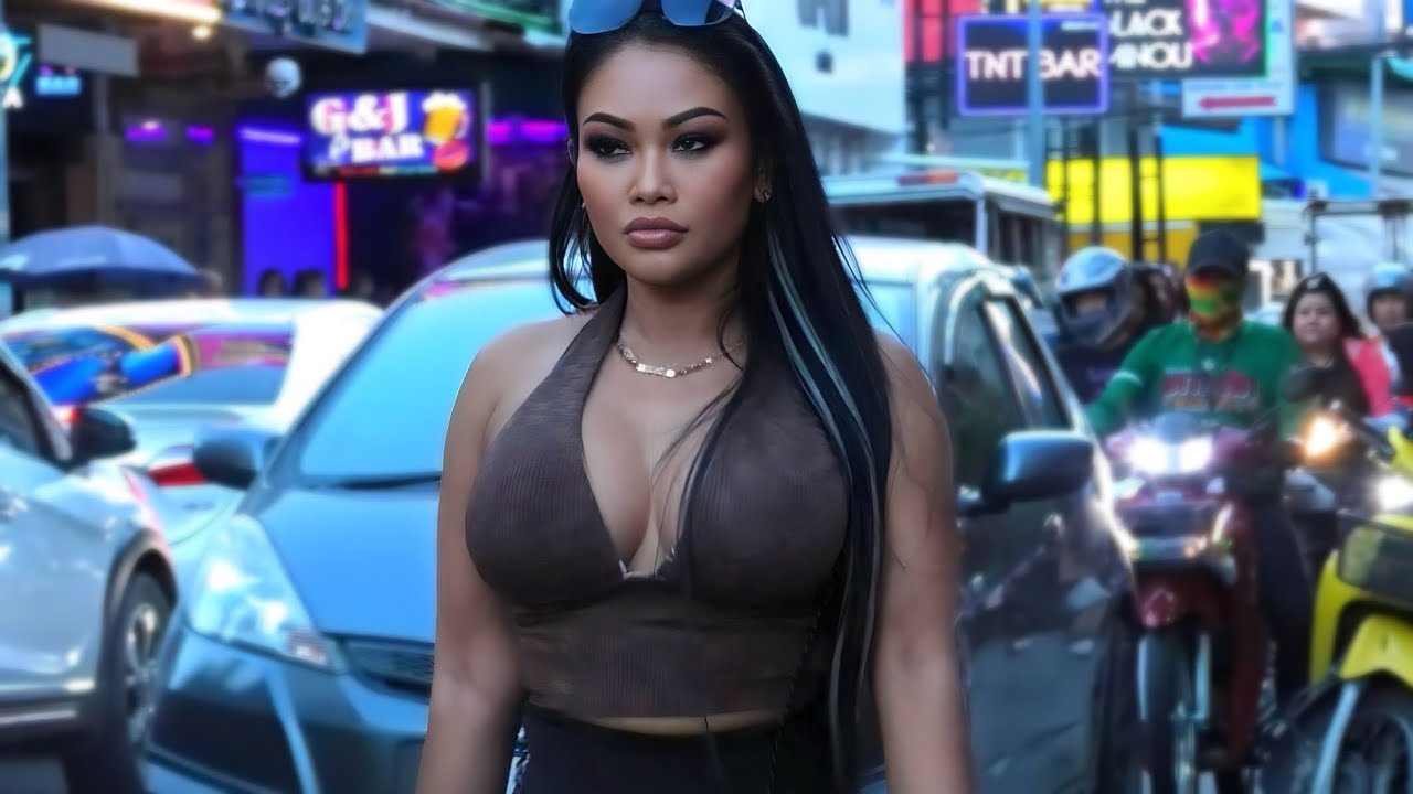 SHE STANDS OUT FROM THE CROWD in Pattaya Soi Buakhao, Thailand in November 2023