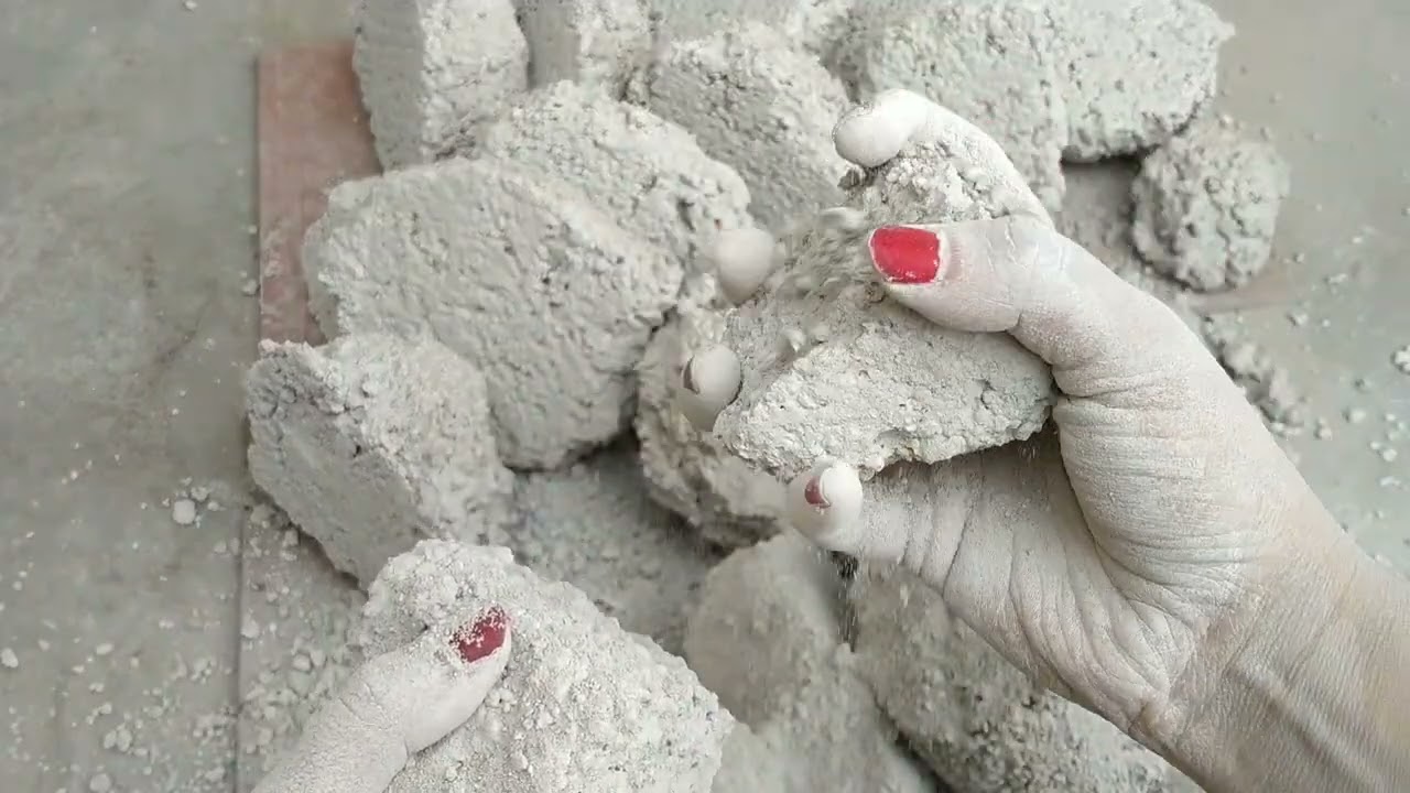 White dirt dry crumbling in tub + gritty texture crumbling