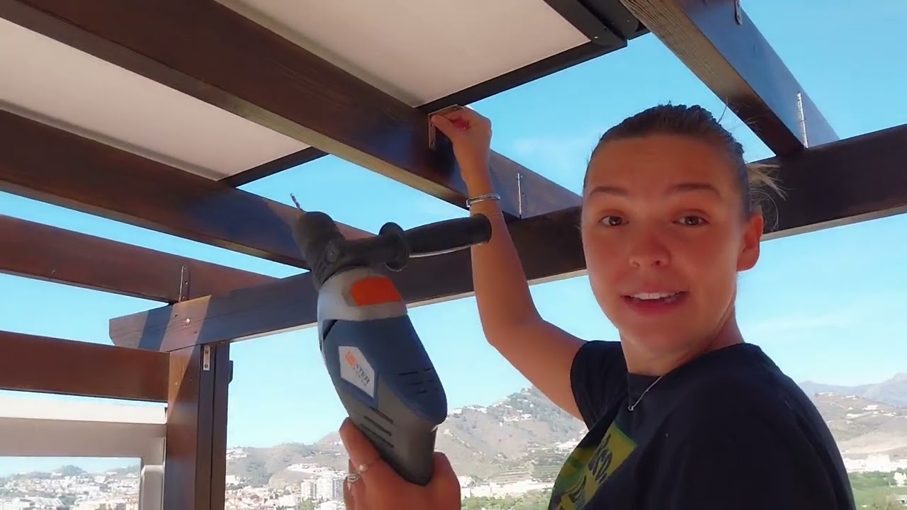 Fixing Solar Panels to A Pergola using Girl Power