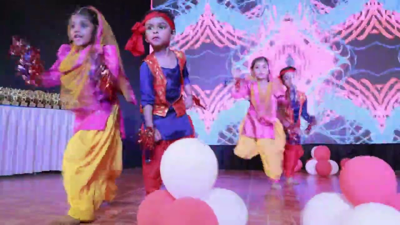 Our LKG little performers lighting up the stage with their dance magic.