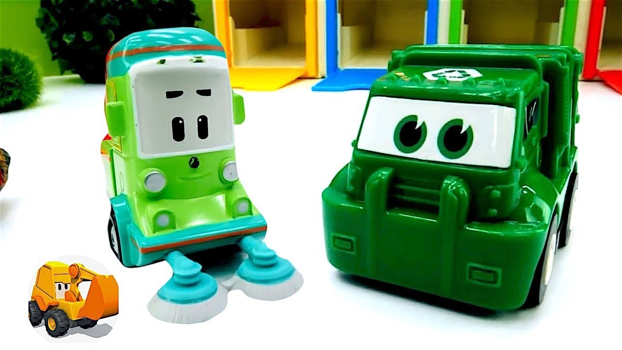 Carritos - Camión escoba y camión de la basura limpian la carretera