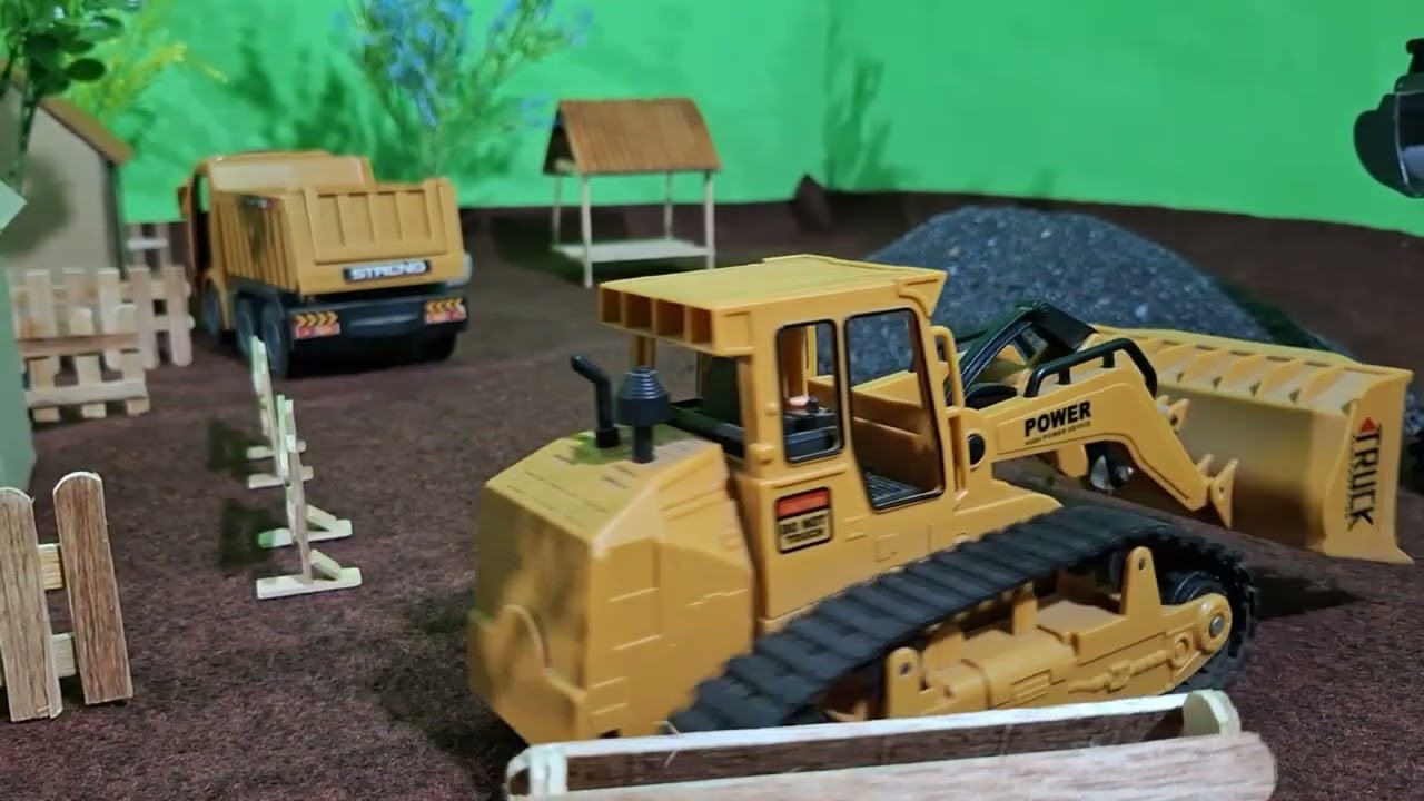 Rc excavator, buldozer,dump truck parkir rapi stelah bekerja 