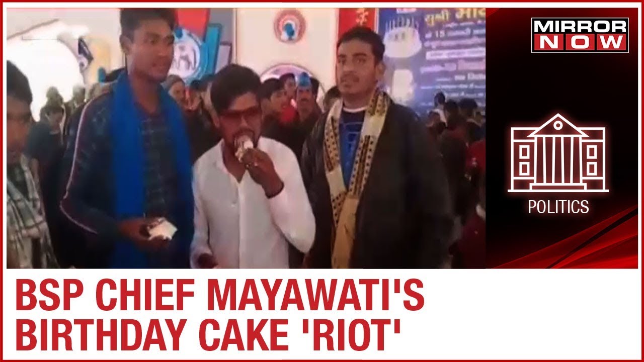 BSP workers fight for cake after celebration of BSP Chief Mayawati's birthday