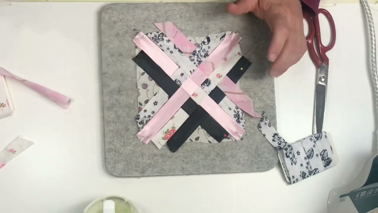 Hand weaving fabric to create a motif for a current project.