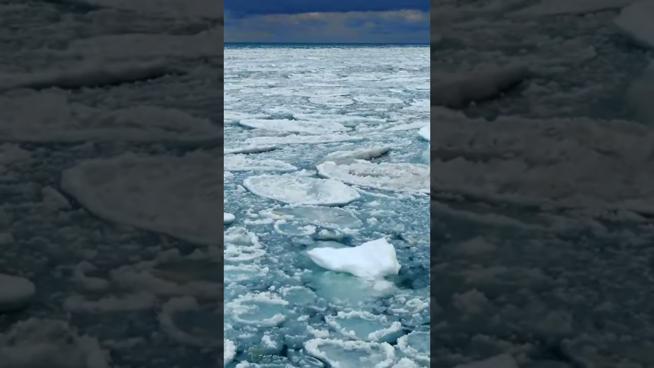 Massive rolling ice waves along the coast of Michigan City #drone #iceberg #newvideo