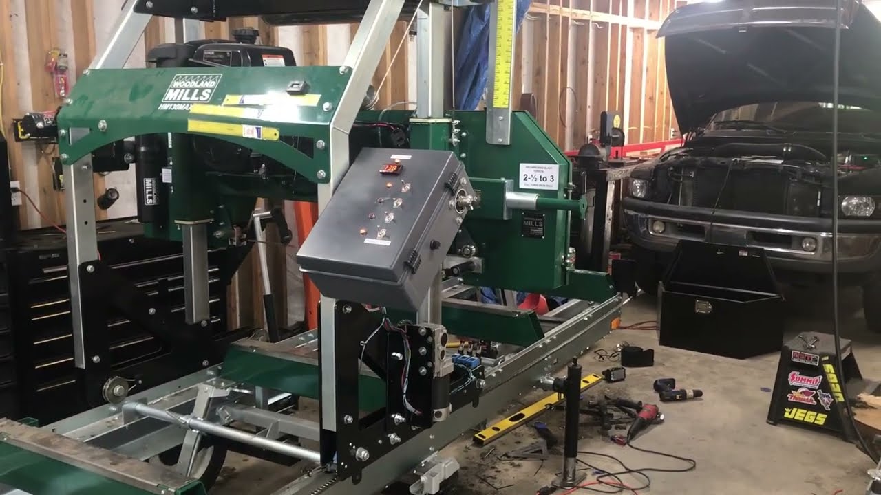 Woodland mills HM130MAX  wheelchair motor  powered auto feed.            2500lb winch power head