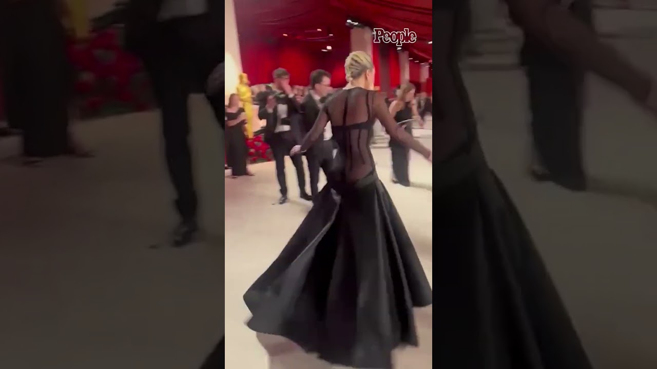 Lady Gaga Helps a Photographer After He Falls on the Oscars Carpet 