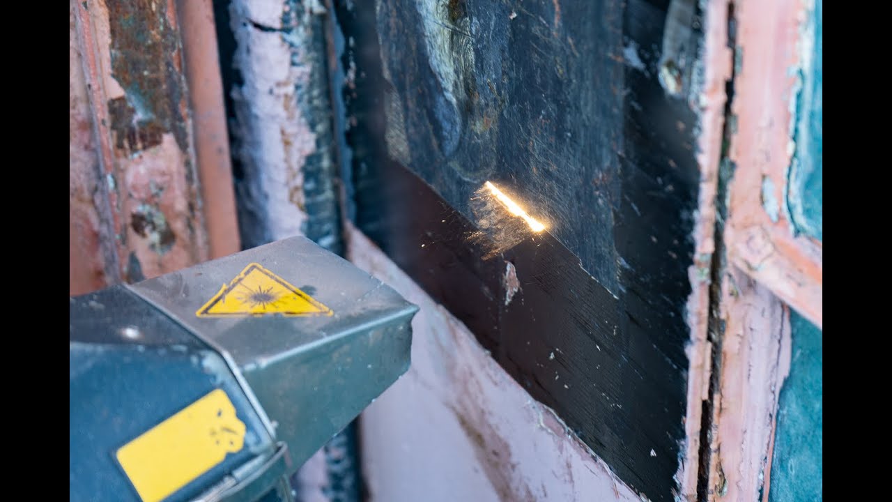 Using a laser to remove lead paint off 80 year old steel hanger door