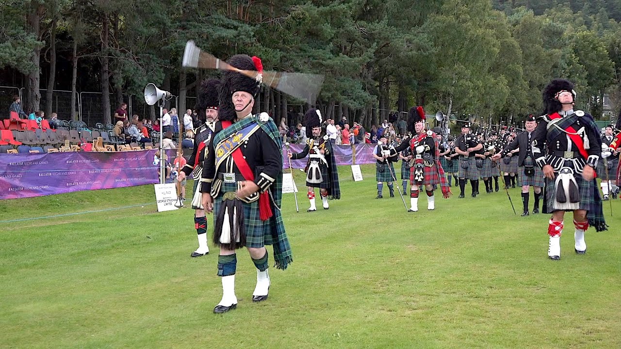 Drum Major Bill Barclay proving he's Master of the Mace flourish at Scottish Highland Games