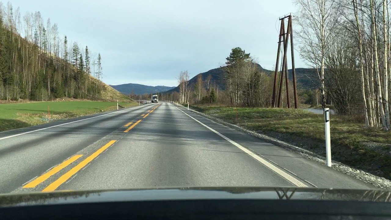 Driving (Riksvei 3) in Norway from Opphus Station to Evenstad Railroad crossing