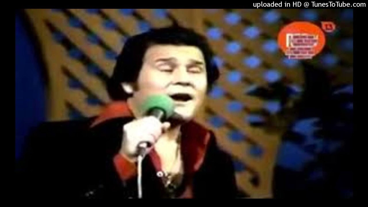 LEO DAN - ESSA PAREDE ( ESA PARED ) Canta en Portugues