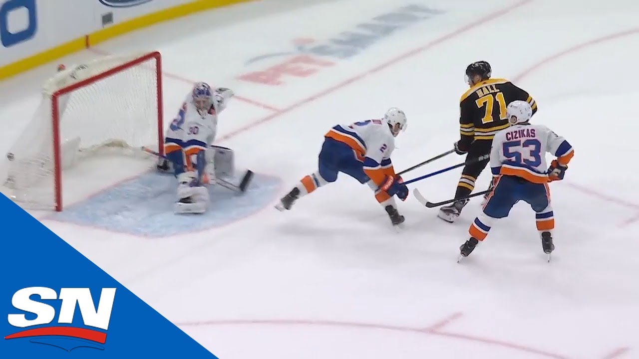 Taylor Hall Slides Puck Through Nick Leddy's Legs To Himself For OT Winner