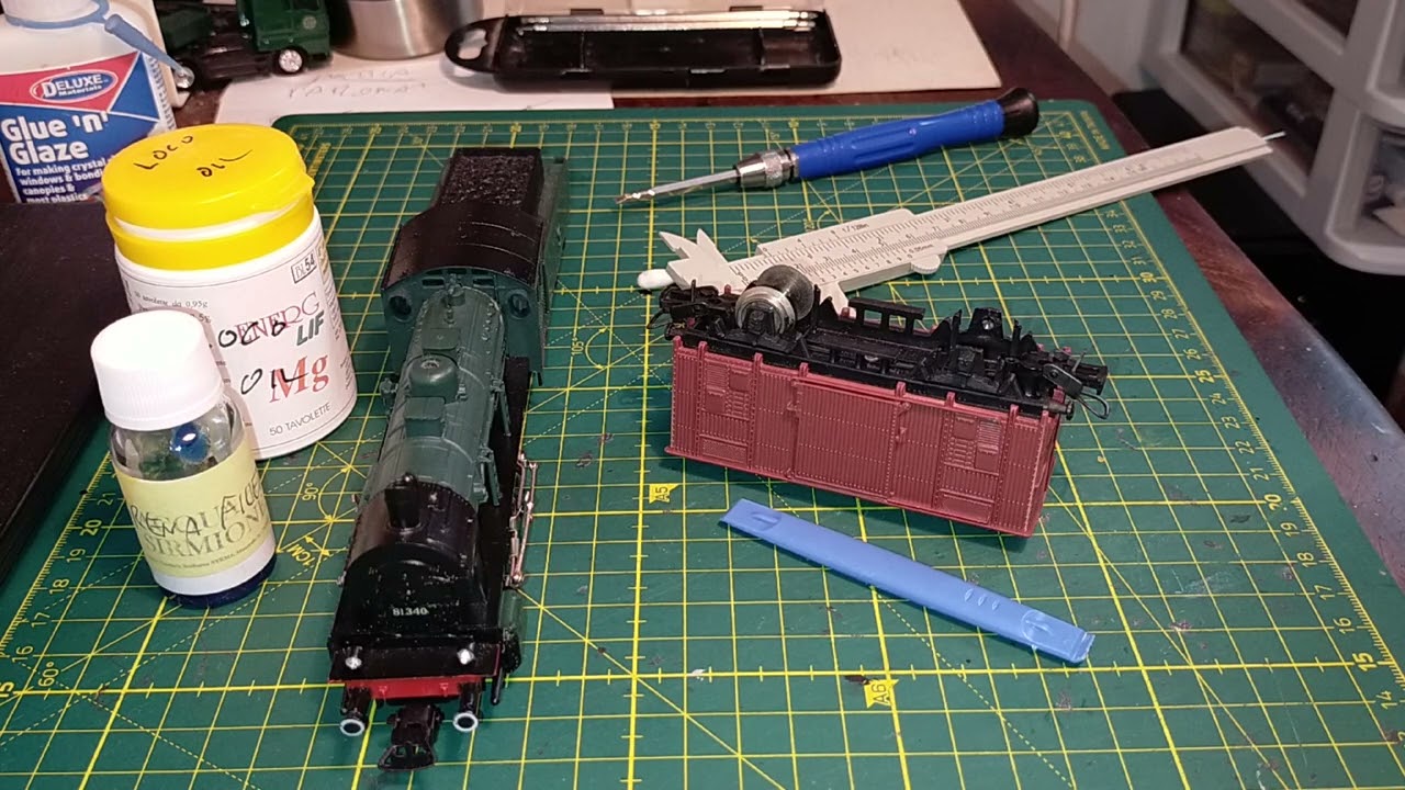 Piko DDR HO BR55 tender locomotive reassembly and Lima goods van repair.