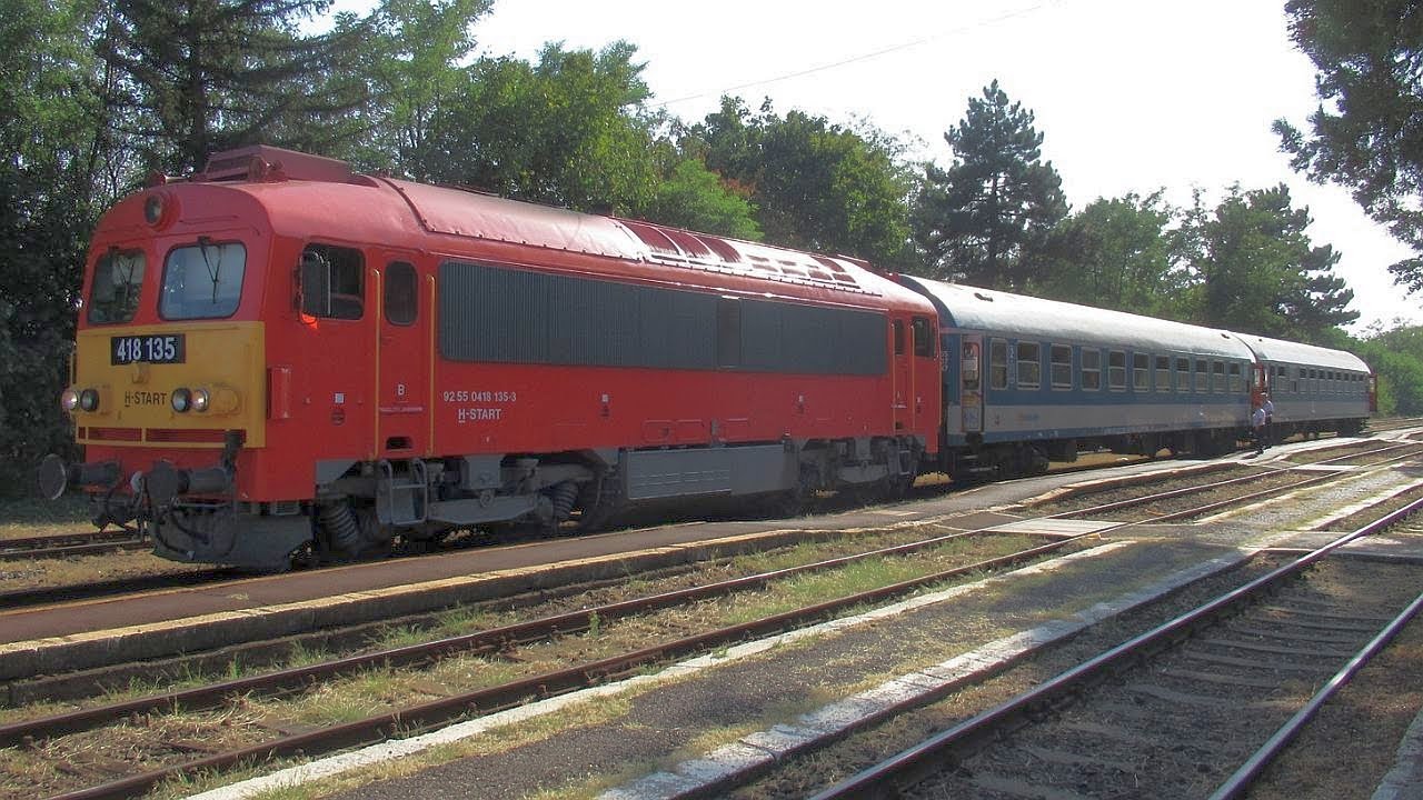 Hungary: MAV Class 418 (M41) diesel loco departs from Csorvas on a Szeged to Bekescsaba train
