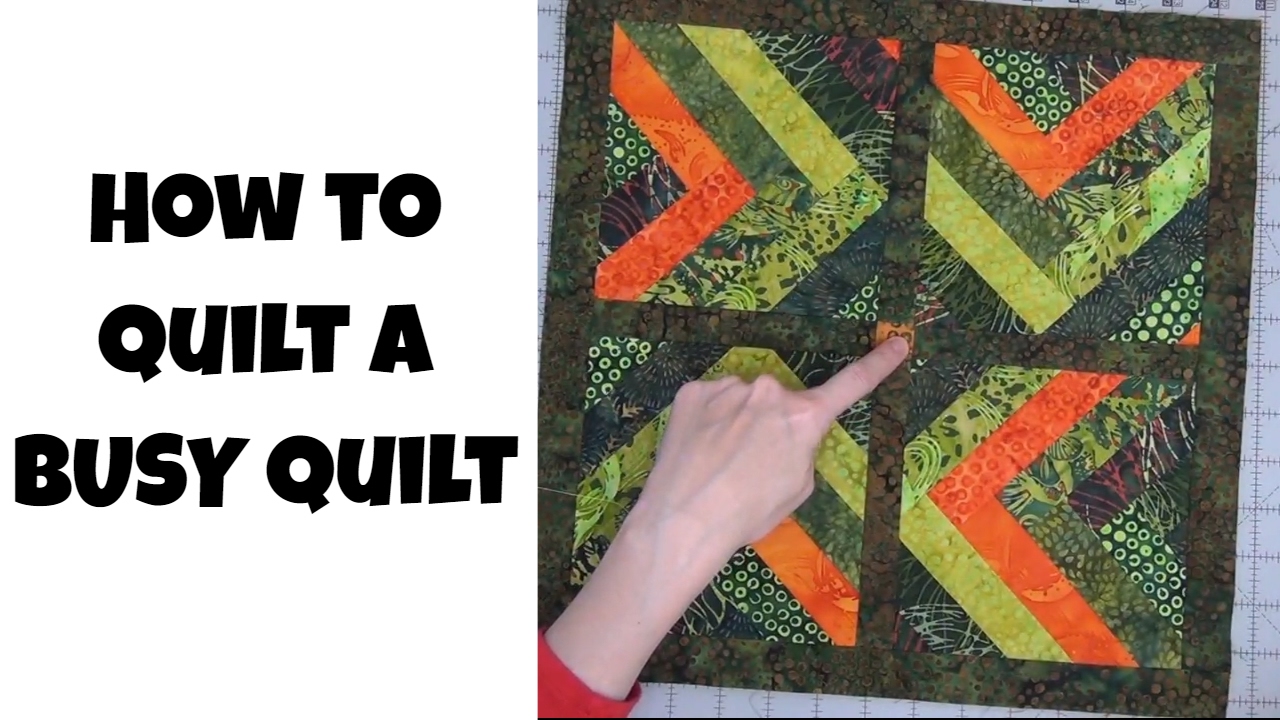 How to Quilt a Busy Quilt Top - Free Motion Quilting and Ruler Foot Quilting with Leah Day