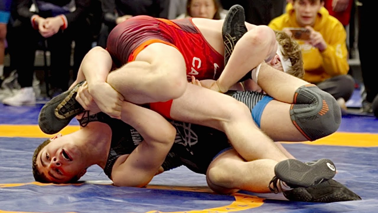 U17 Liam Gorton (CAN) vs Andriy Drohomyretskyy (UKR) 65kg. Freestyle boys wrestling. B-cam-man