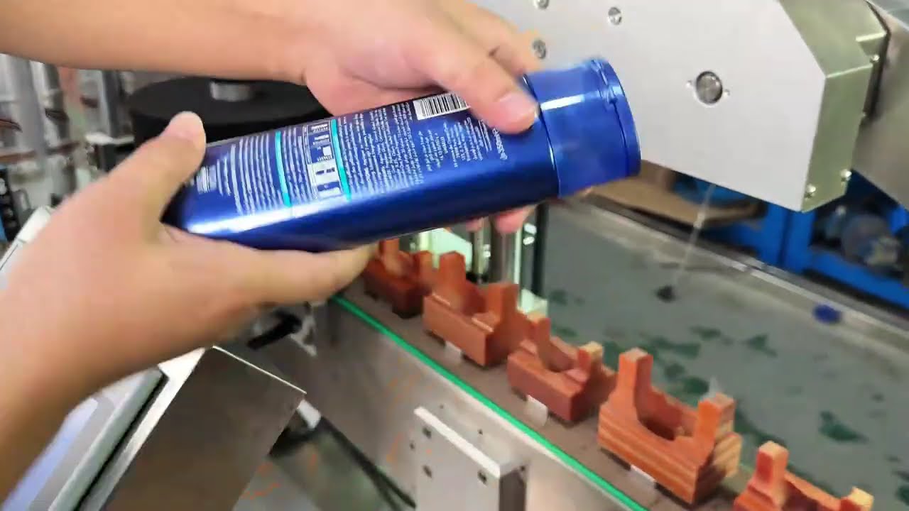 Tracking filling capping &double sided labeler (fixed pucks to hold products) for deodorant barrel