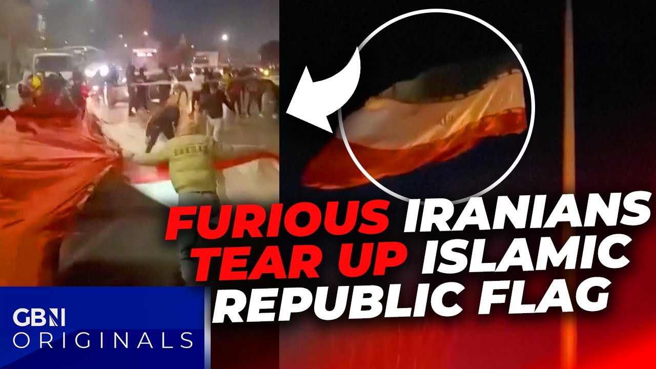 WATCH: FURIOUS Iran protesters TEAR Islamic Republic flag down as violent clashes spread | LATEST
