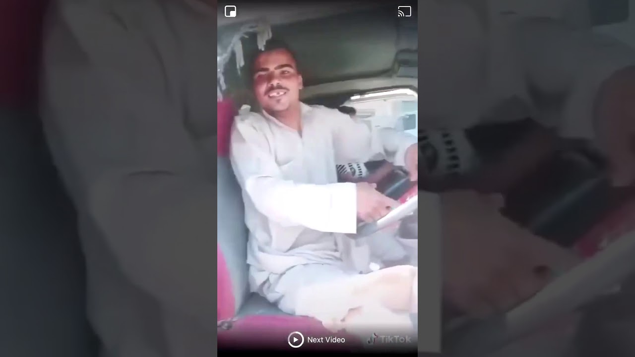 Egyptian man playing the car horn  