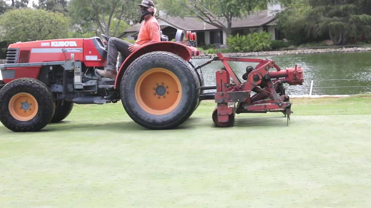 Verti-Drain Tractor used on Golf Course