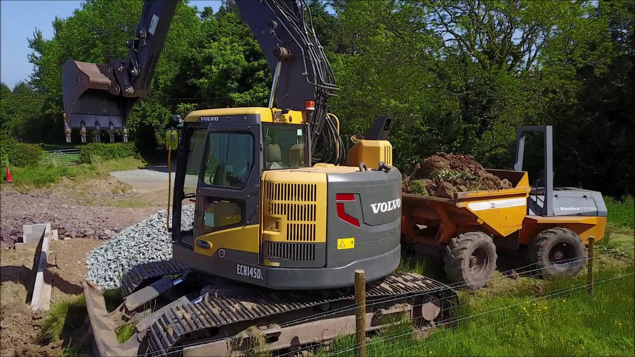 Building a house (Part 1) | Grading dirt with the Volvo ECR145DL Excavator