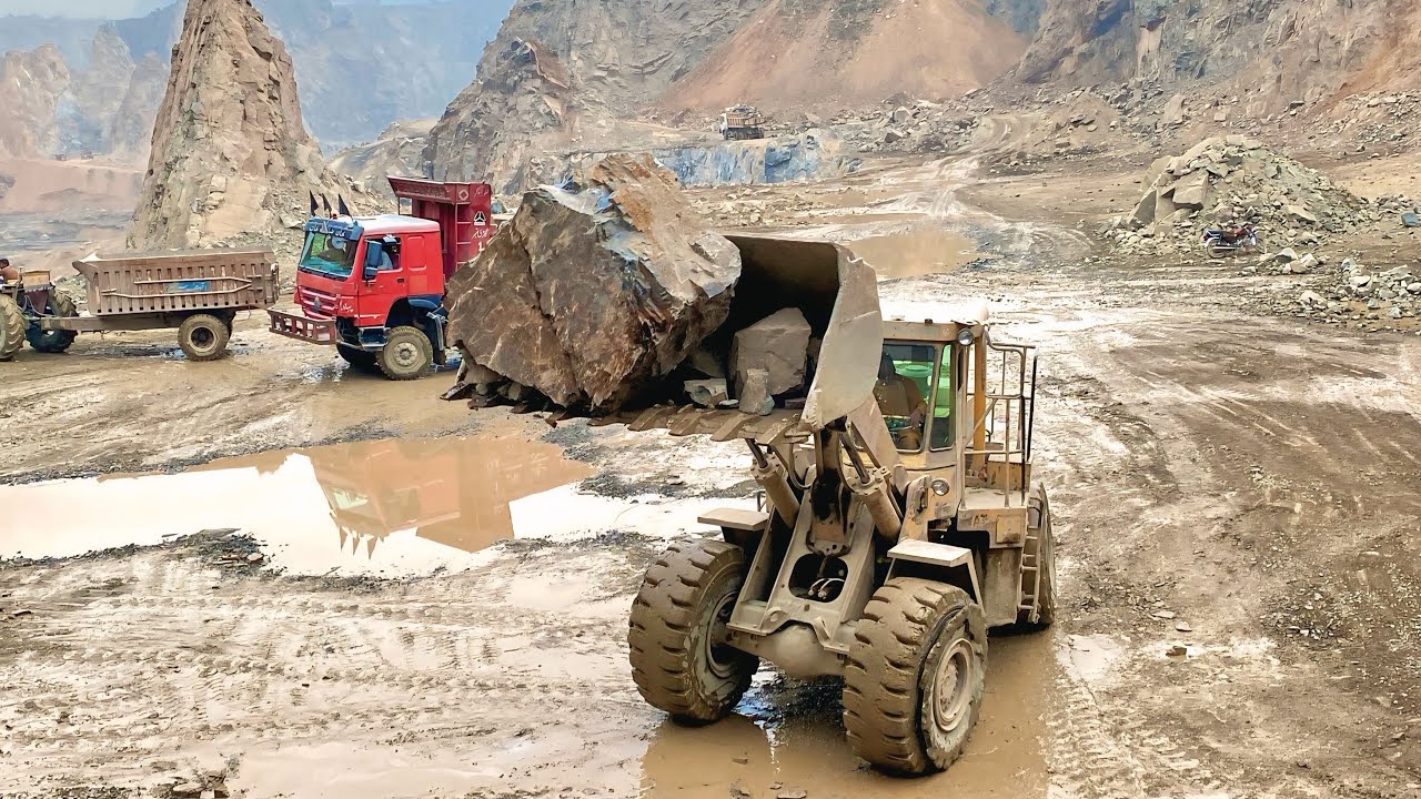 Massive Rock Loading Show By Powerful 966 Wheel Loader 