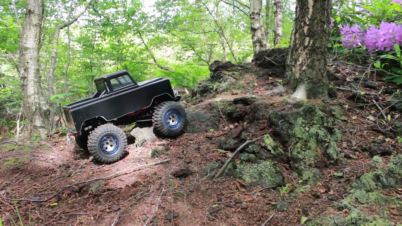 FTX Outback Ranger 2 with 2.2 Monster wheels , Kamtec Landrover bodyshell Bonus wheelies at end :)