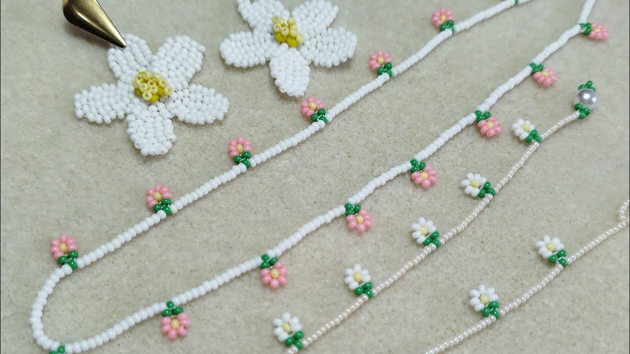 Collar de margaritas o flores colgantes.