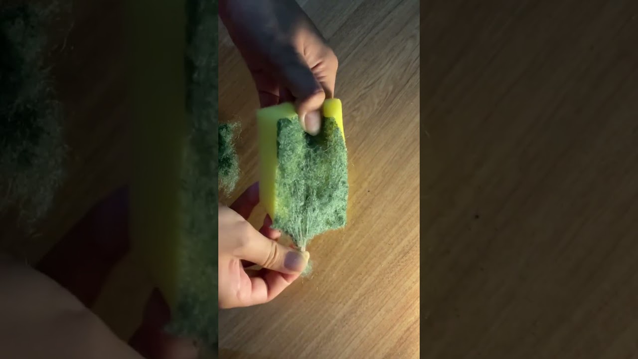 Kitchen sponge rips and scratches .
