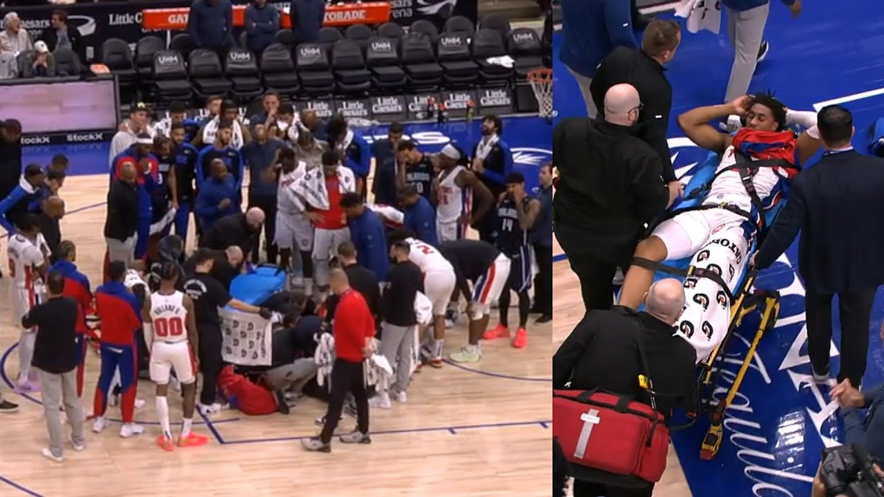 Pistons & Magic surround Jaden Ivey after scary leg injury then gets stretchered off