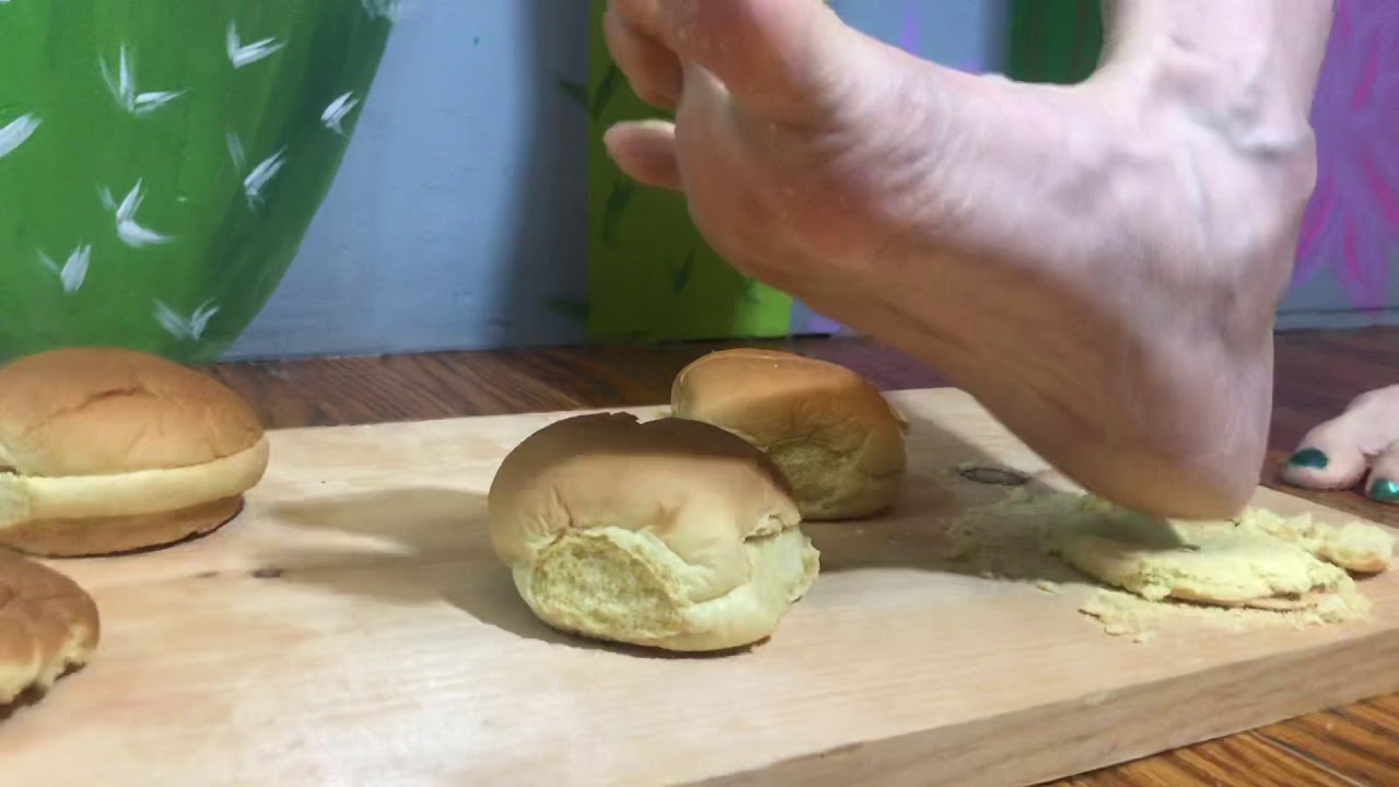 Crushing white bread very crunchy with bare feet