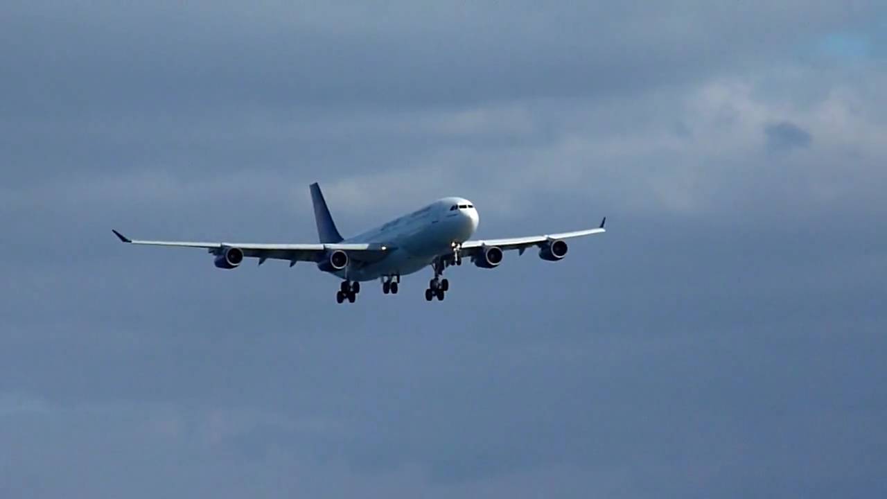 EgyptAir Airbus A340-200 SU-GBO landing at KIX (Osaka - Kansai Int'l Airport)