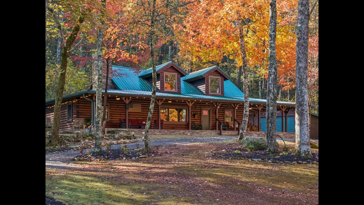 Custom built cabin. Private 17 acre park-like paradise with a swimming pool, meandering creek, pond.