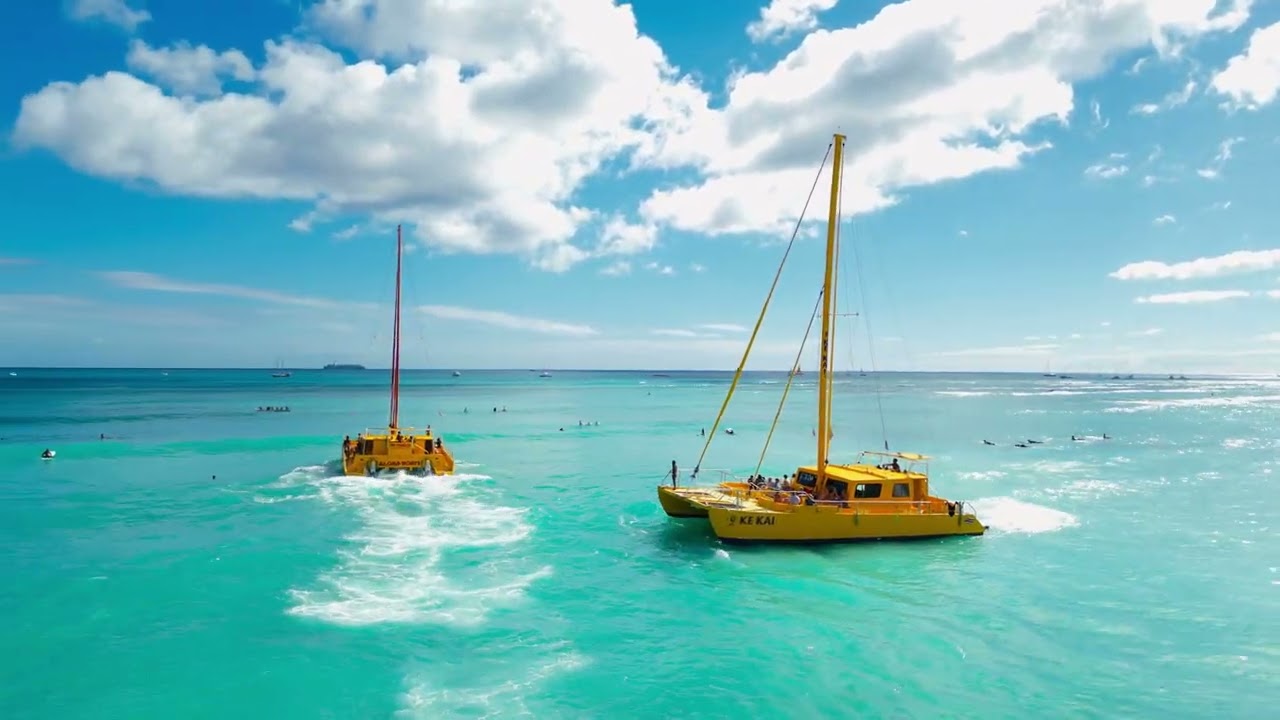 Na Hoku 3 and Ke Kai Catamarans sailing from Waikiki Beach