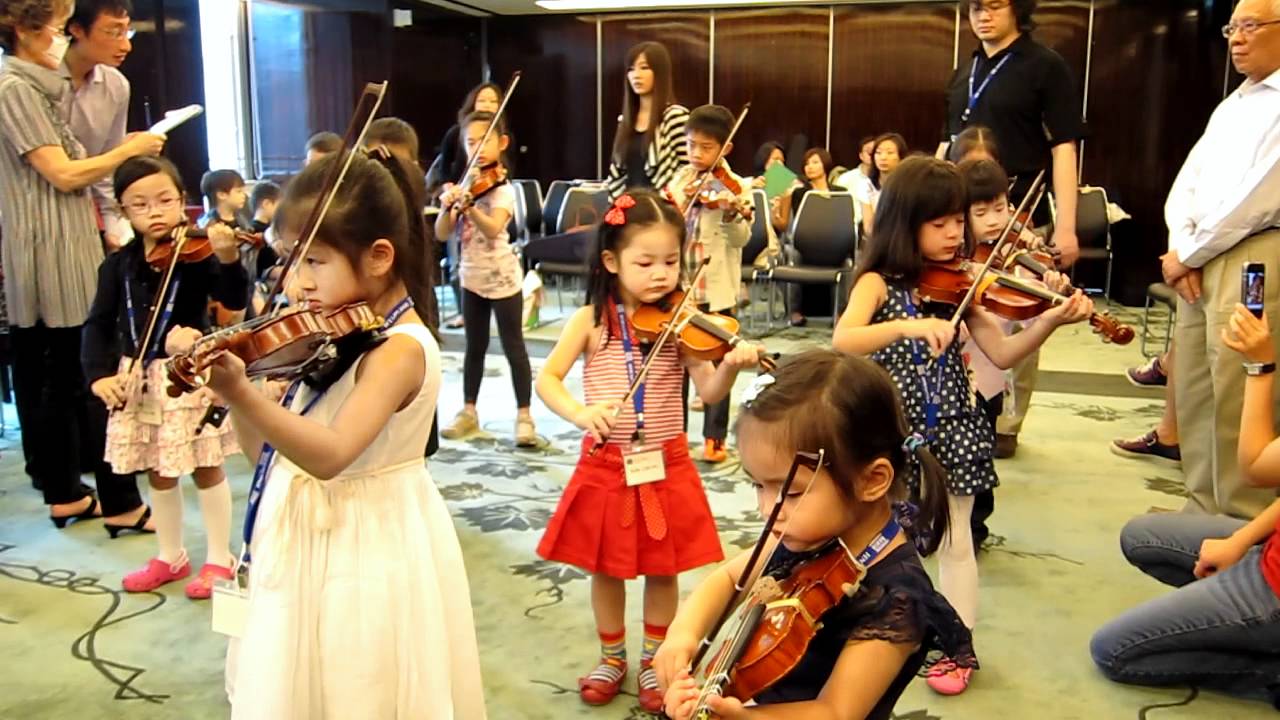 Suzuki Violin Kelly in group lesson with Takako Nishizaki Sensei