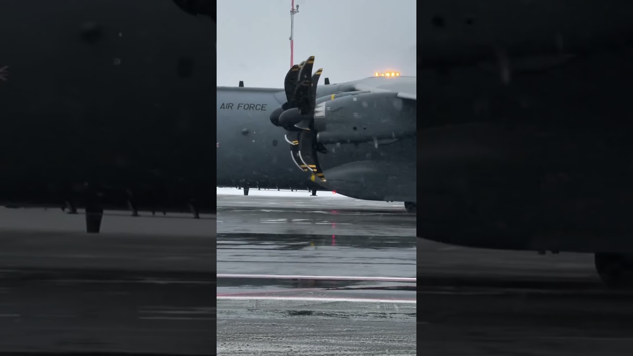 RAF Airbus A400 Undergoes De-Icing at Ottawa Airport on Snowy Evening ❄️✈️