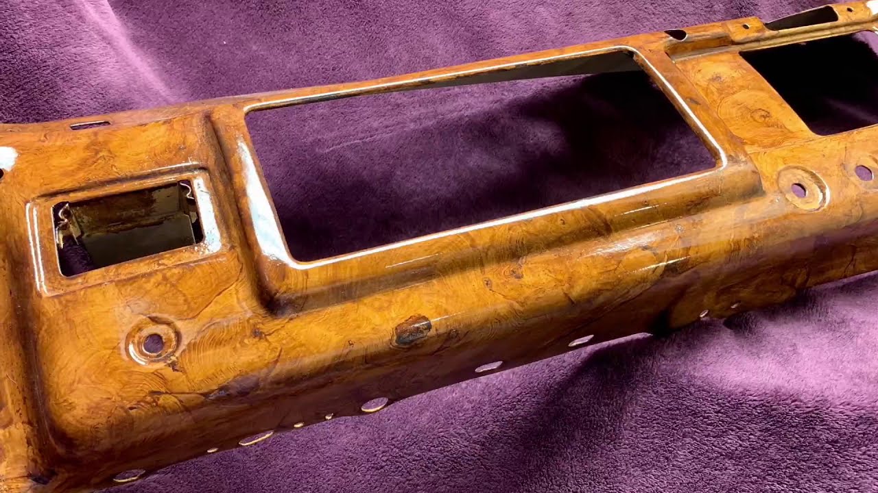 Hand faux painted wood grain on an antique dashboard