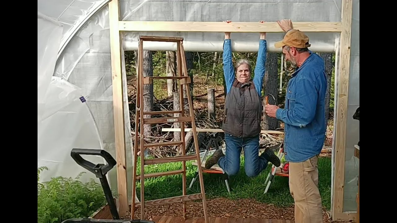 Strong DIY End Wall Framing for a Greenhouse High Tunnel double zipper door, with a Solar Fan
