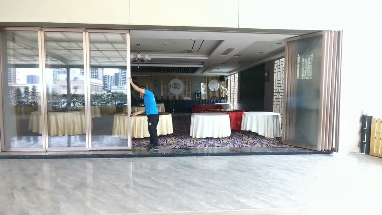 Sliding glass partition wall