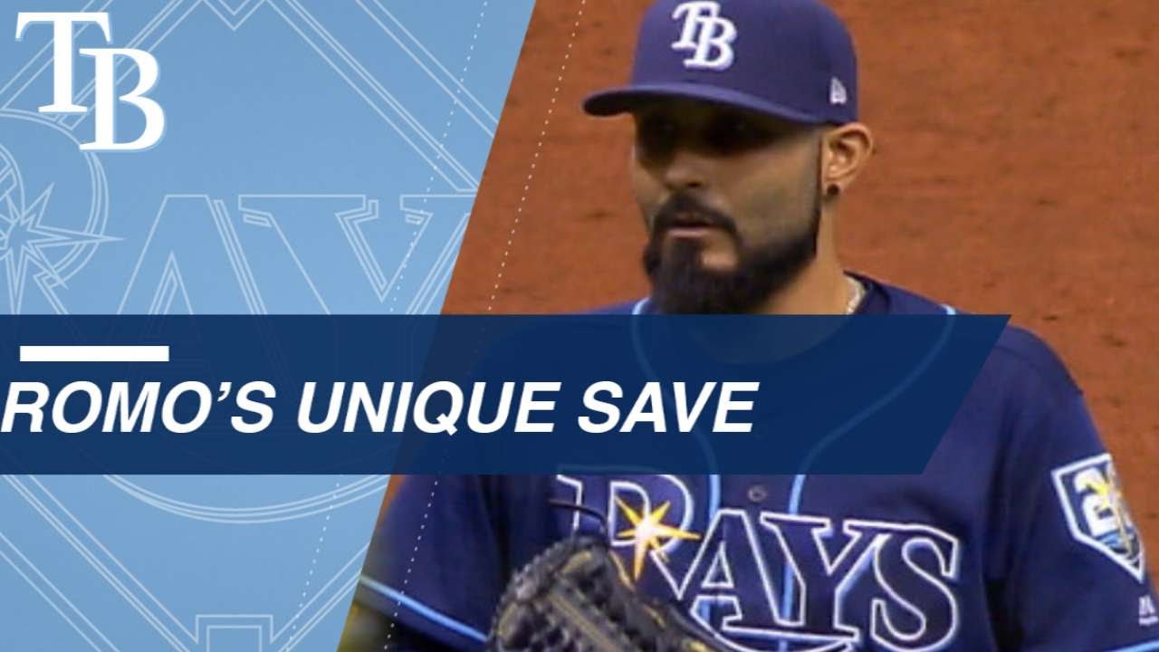 Sergio Romo plays third, earns the save
