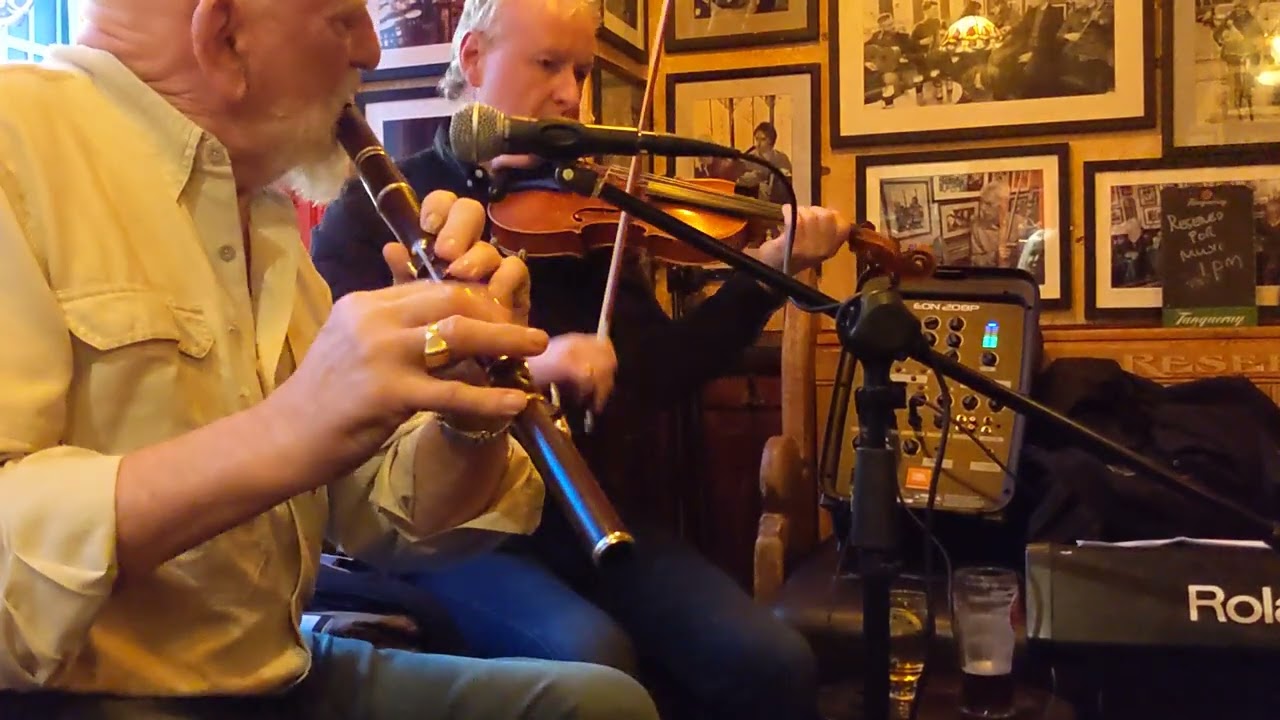 Matt Molloy , John Carty and Brian McGrath playing in Tig Choili , Galway